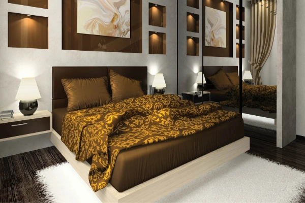 The Luxurious brown motif and the plush headboard of this Bedroomtake elegance to the next level