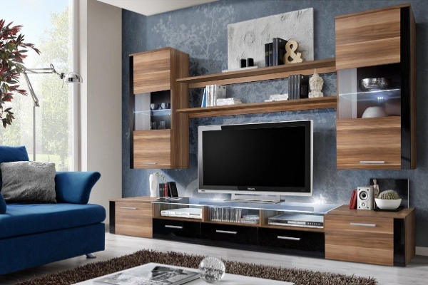 A Tv unit with a hiddn Dresser and lots of storage options